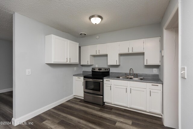 kitchen with sink, stainless steel range with electric stovetop, white cabinetry, and dark wood-type flooring