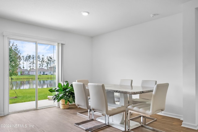 2035 Garrison Way, Green Cove Springs, FL 32043 - dining area featuring a water view and hardwood / wood-style flooring