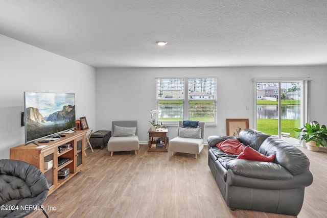 2035 Garrison Way, Green Cove Springs, FL 32043 - living room with a water view and light hardwood / wood-style flooring