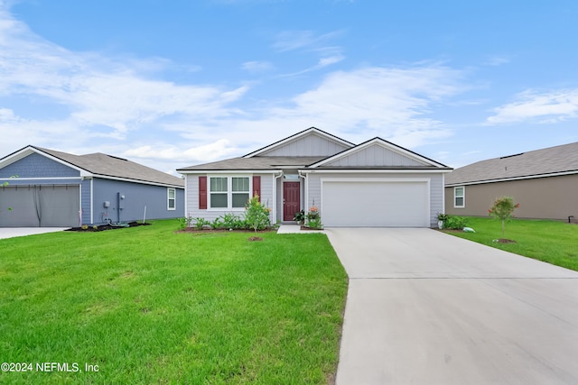 2035 Garrison Way, Green Cove Springs, FL 32043 - single story home with a garage and a front yard