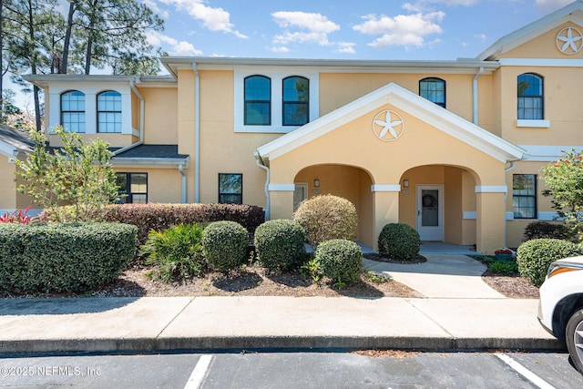 view of property with stucco siding