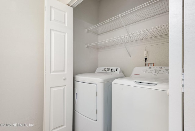 clothes washing area with laundry area and independent washer and dryer