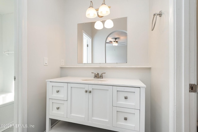 bathroom featuring ceiling fan and vanity