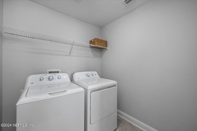 laundry area featuring washer and dryer