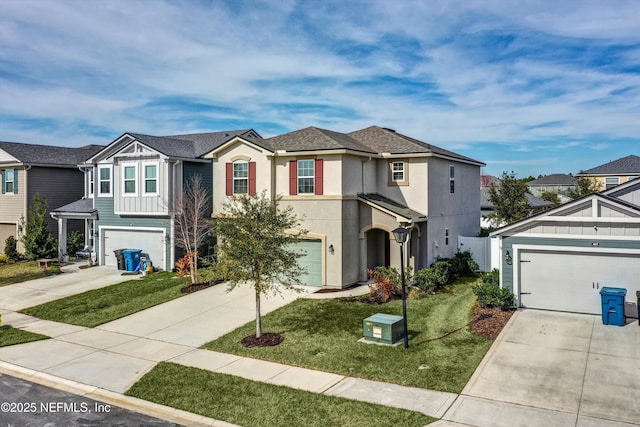 view of front of home with a garage and a front yard