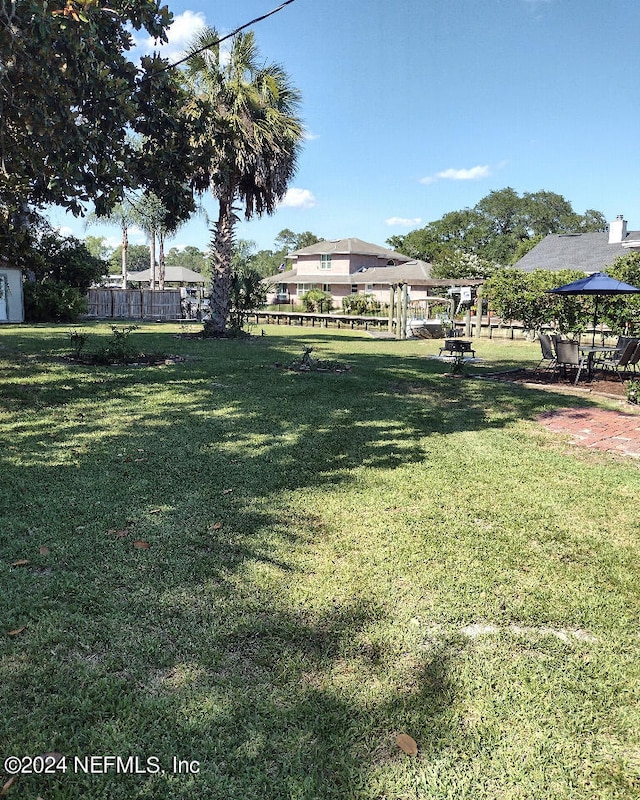 view of yard with fence