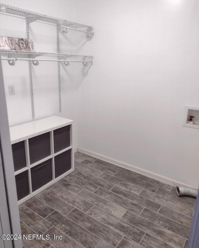 walk in closet featuring wood tiled floor