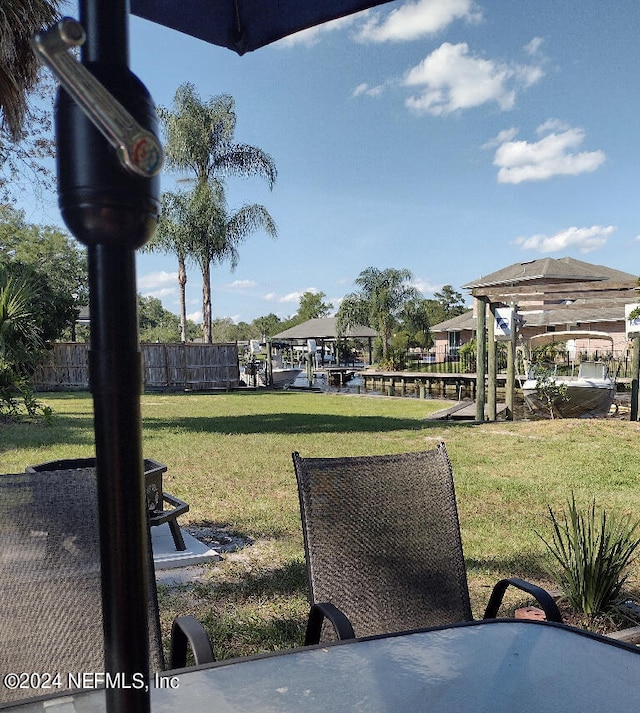 view of yard featuring fence and a gazebo