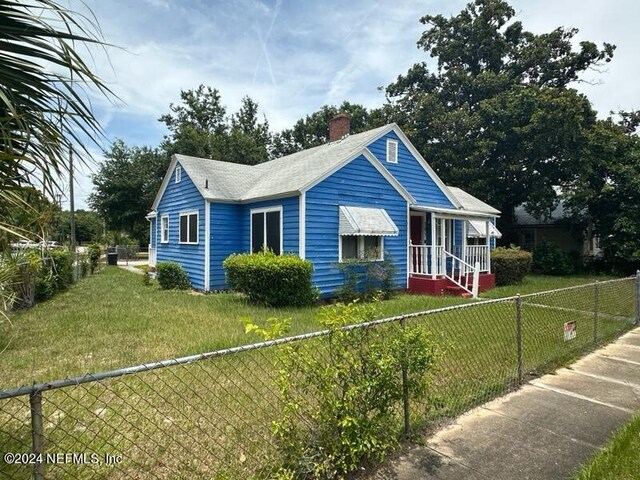 bungalow with a front yard