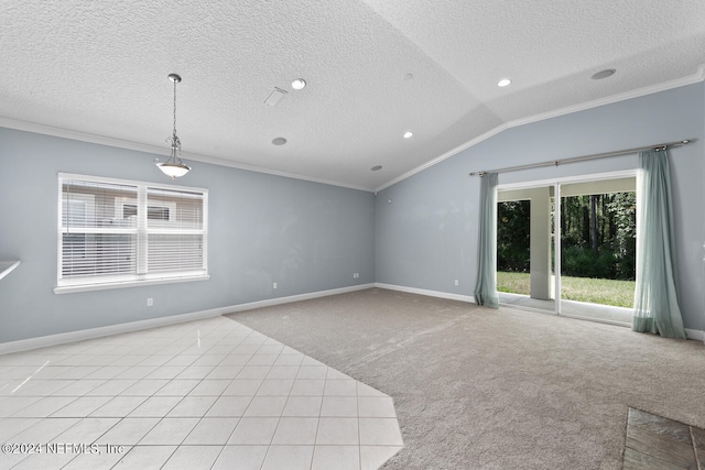 carpeted spare room with a textured ceiling, vaulted ceiling, and ornamental molding