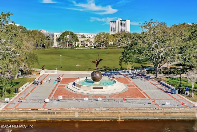 view of community with a water view