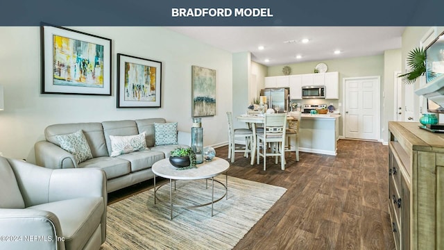 living room with recessed lighting, baseboards, and dark wood-style flooring