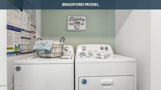 washroom featuring washer and dryer