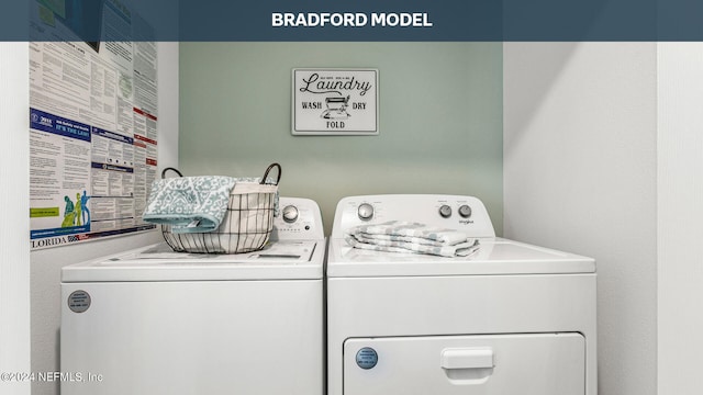 clothes washing area featuring independent washer and dryer and laundry area