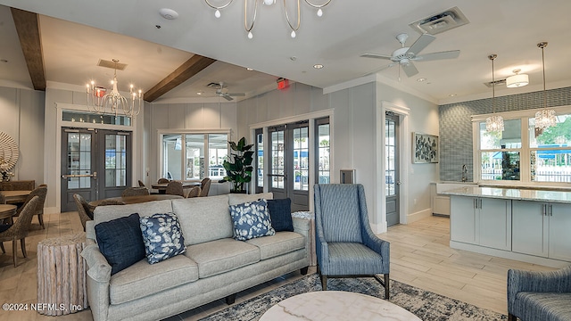 living room featuring french doors, beamed ceiling, light hardwood / wood-style floors, and ceiling fan with notable chandelier