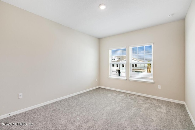 view of carpeted spare room