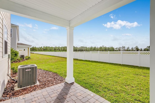 view of yard featuring central AC unit