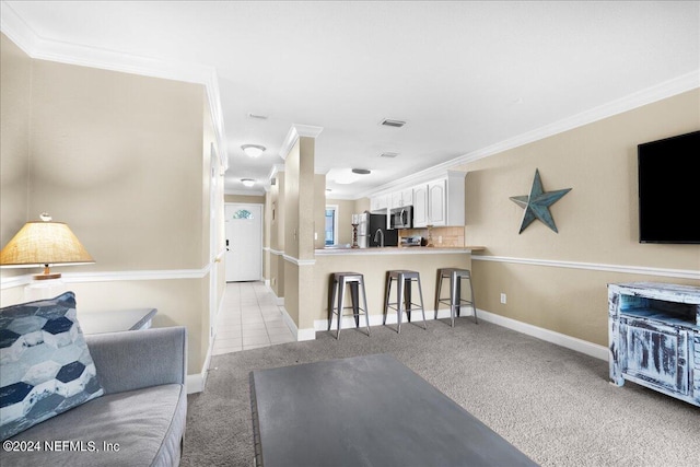 carpeted living room with ornamental molding