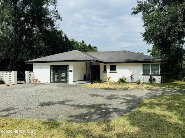 single story home with french doors