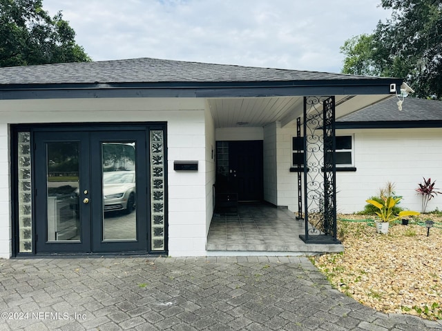 entrance to property featuring french doors