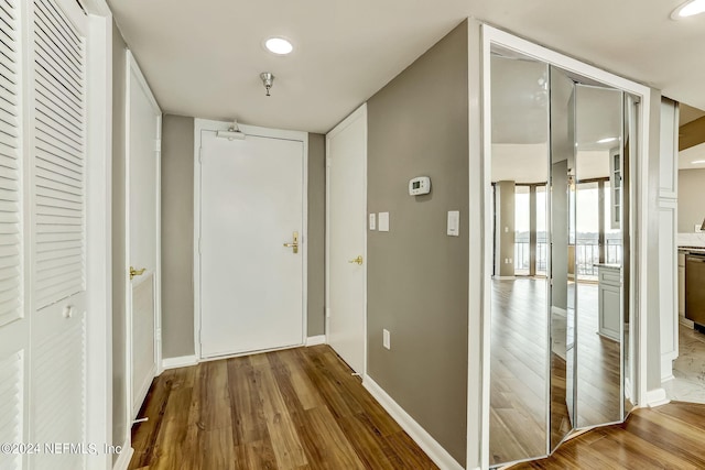 hall featuring hardwood / wood-style flooring