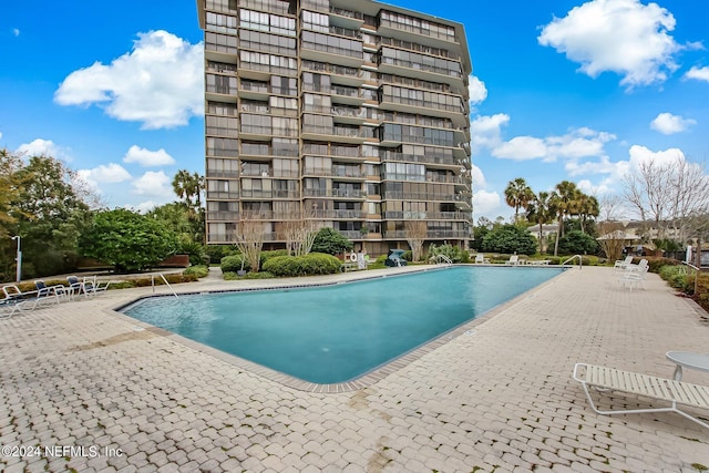 view of pool with a patio