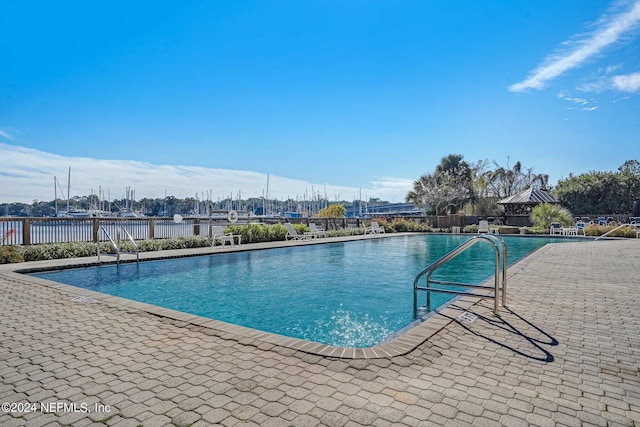 view of pool with a patio area