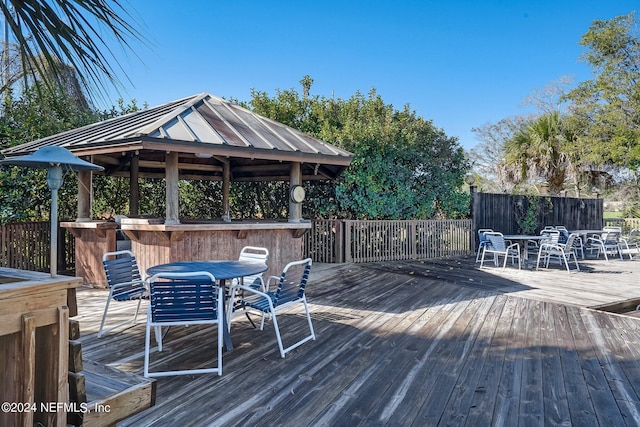 wooden deck featuring a gazebo