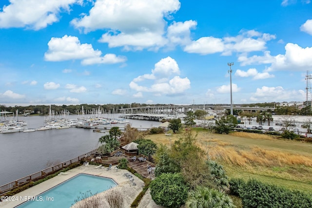 birds eye view of property with a water view