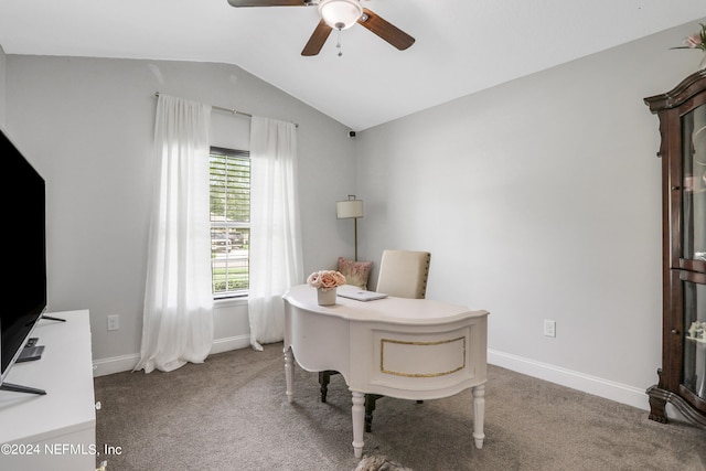 carpeted office space with lofted ceiling and ceiling fan