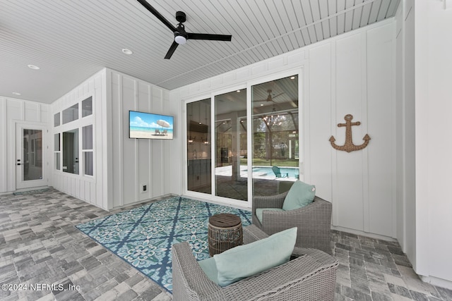 view of patio / terrace featuring ceiling fan