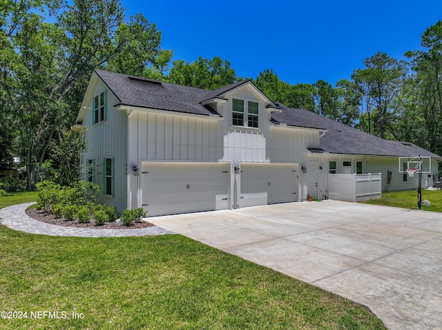 exterior space featuring a yard and a garage