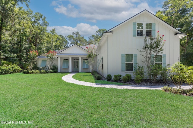 view of front of house with a front lawn