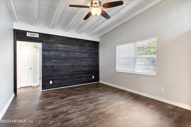 empty room with wood ceiling, vaulted ceiling with beams, ceiling fan, and dark wood-type flooring