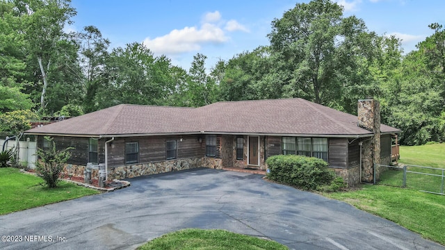 view of front of home with a front yard