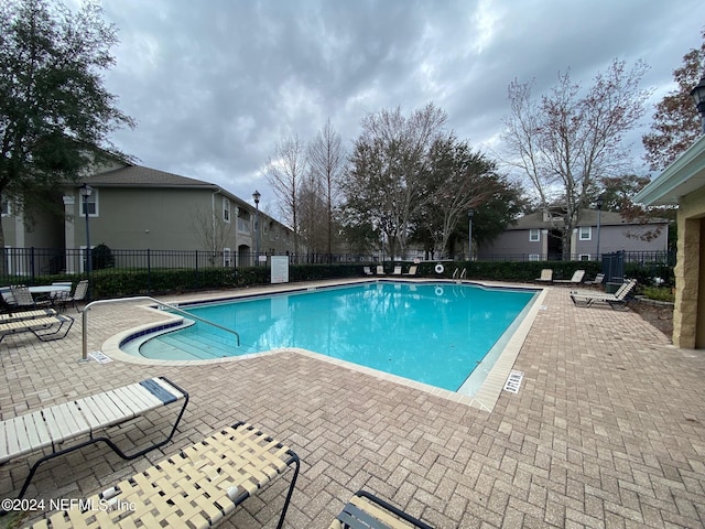 view of pool with a patio area