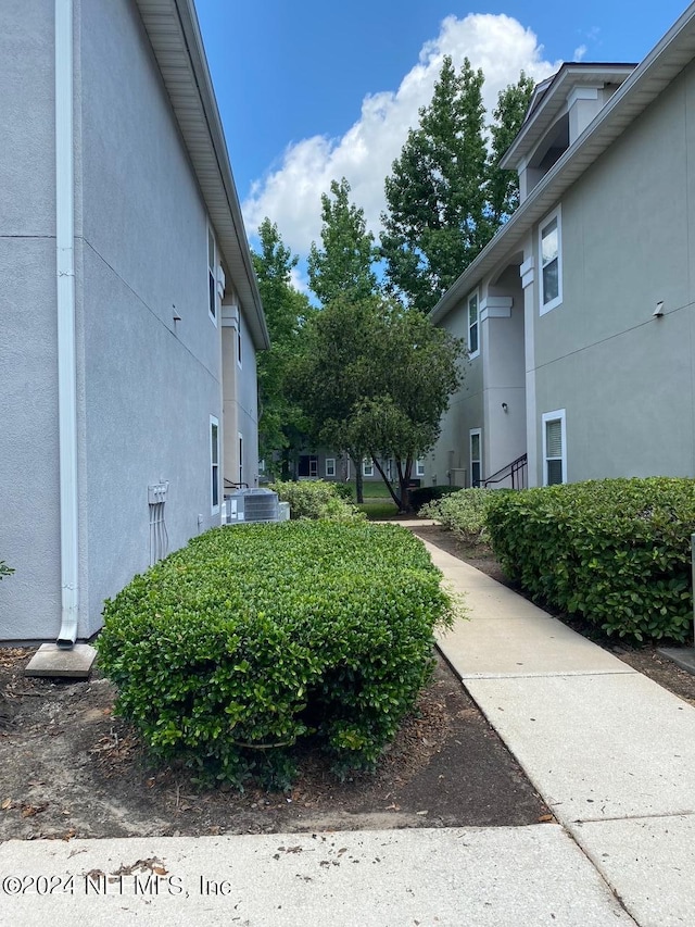 view of yard featuring central AC