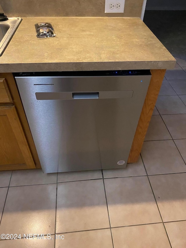 details featuring sink and stainless steel dishwasher