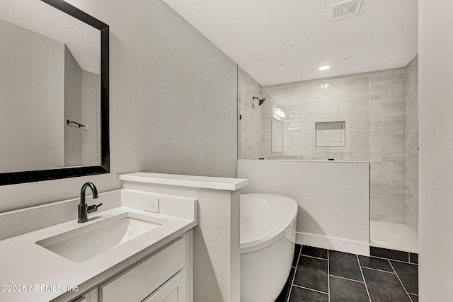 bathroom with vanity, separate shower and tub, and tile patterned flooring