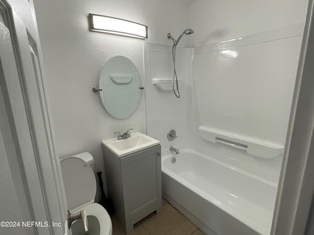 full bathroom featuring shower / tub combination, vanity, toilet, and tile patterned floors