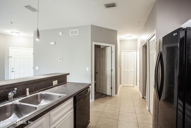 kitchen with dishwasher, sink, refrigerator, pendant lighting, and white cabinets