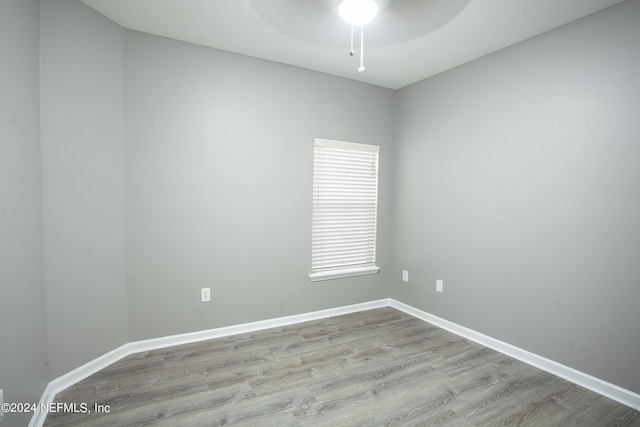 unfurnished room featuring light hardwood / wood-style floors