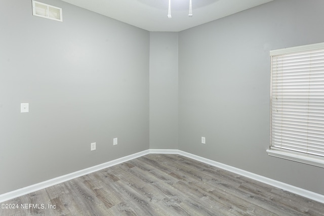 empty room featuring light hardwood / wood-style floors