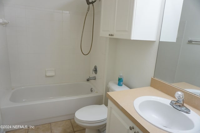 full bath with toilet, tile patterned flooring, tub / shower combination, and vanity