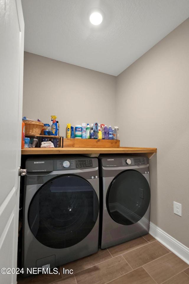 washroom featuring separate washer and dryer