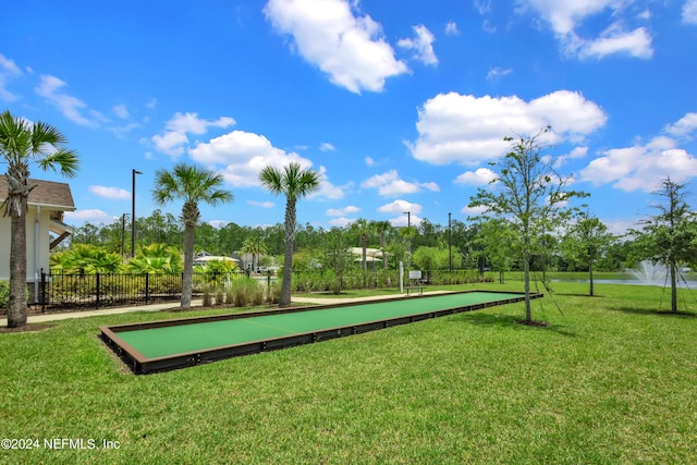 view of community with a lawn