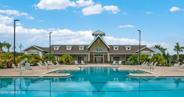 view of swimming pool featuring a patio