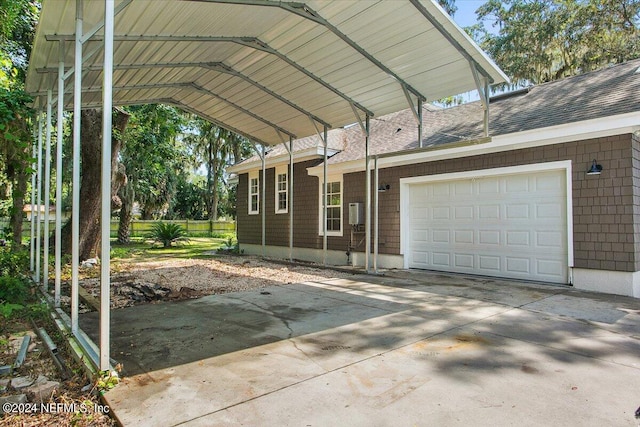 exterior space featuring a garage and a carport