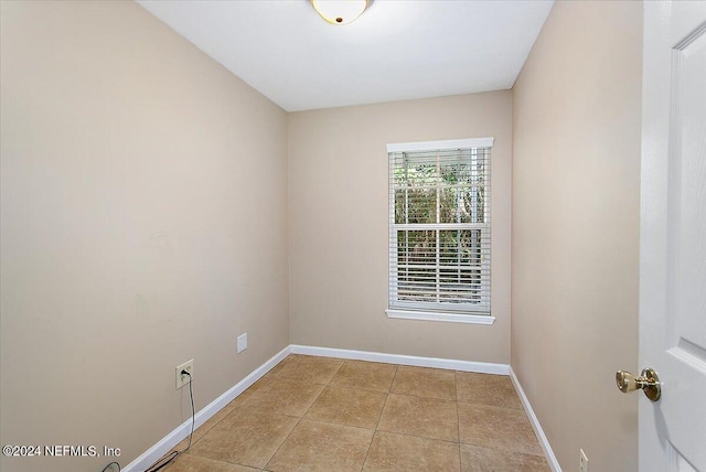 view of tiled spare room