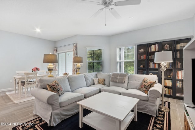 living room featuring ceiling fan